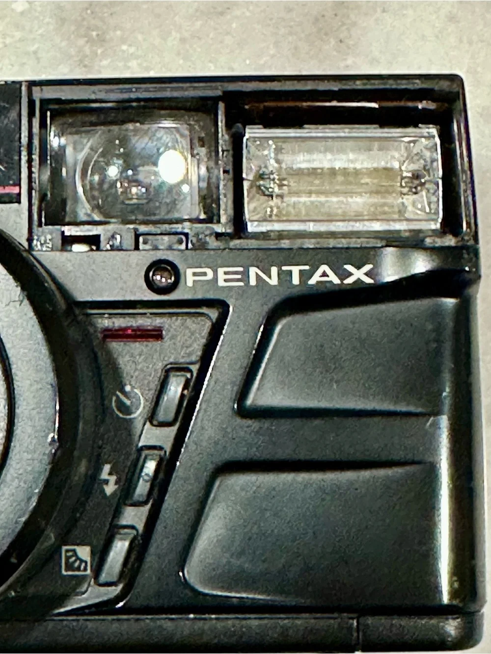 Pentax Black Point-and-Shoot Film Camera with Red-Trim Strap
